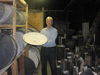 Glass artisan with molds for bending glass