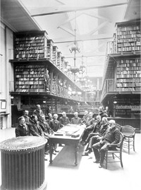 Members of the General Society meet in their library, circa 1878